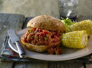 sloppy joe sandwich with corn on the cob