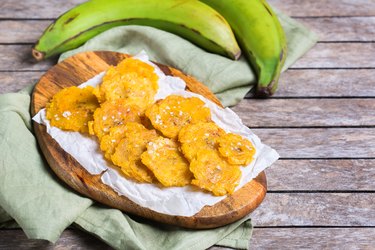 Fried tostones, green plantains, bananas with guacamole sauce - an underrated food in some regions