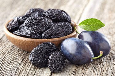 Plum and prunes with benzoic acid