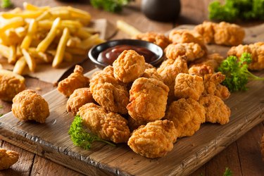 Baked chicken nuggets made from a three-ingredient chicken recipe.