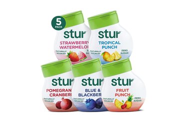 packages of Stur Liquid Water Enhancer water flavoring on white background