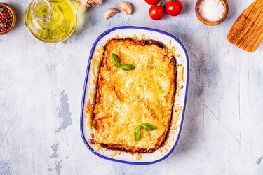 Traditional italian lasagna with vegetables, minced meat and cheese