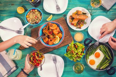 table spread with plates of Mediterranean diet foods