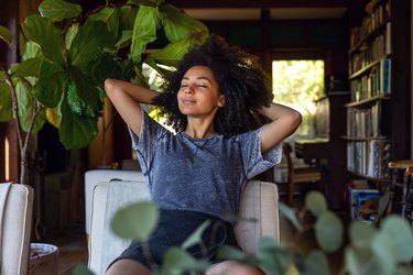 Young woman spending a relaxing day in her beautiful home