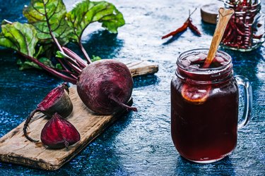 Homemade beet kvass in a glass jar