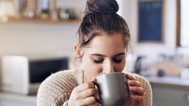 woman drinking coffee with acrylamide